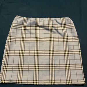 Small blue and white mini skirt from love tree.